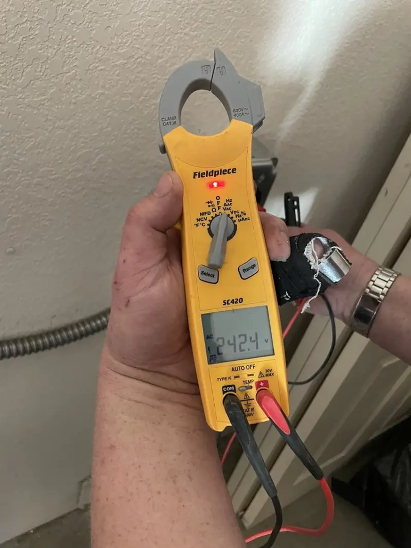 Voltage testing with clamp meter during Generator Installation in Plainville